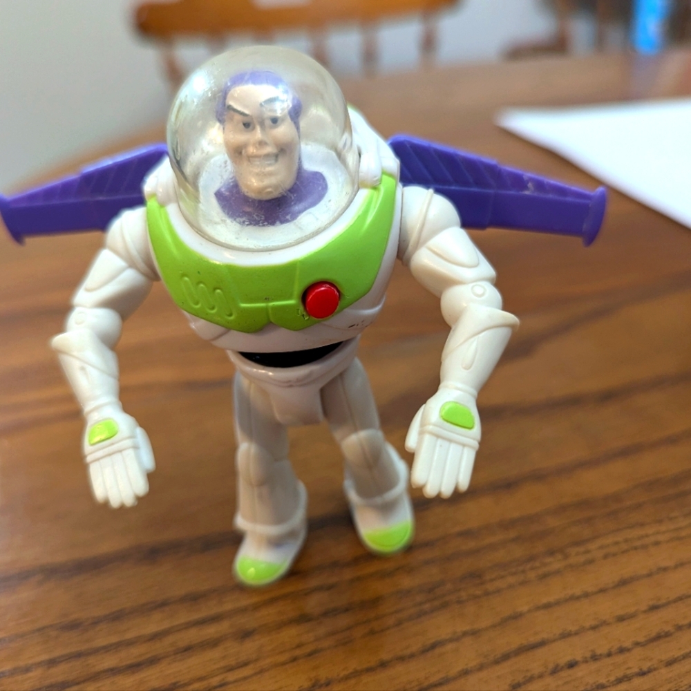 Disney Buzz Lightyear. 4 inches. Toy from Burger King kids meals in 1995. GUC.